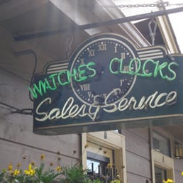 A side entrance to the store is below this sign.
