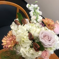 Artistry In Flowers - looks like it came from the trash can