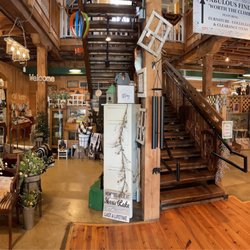 The Shoppes at Homespun - Inside the store --log cabin looking.