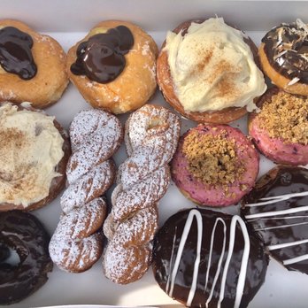 Dutch Monkey Doughnuts - dutch monkey, cinnamon roll, not samoa, cinnamon roll, nutella twist, blueberry cake, chocolate cake, boston creme - Donuts Near Me - Cumming, Georgia