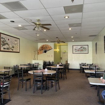 New Mulan Chinese Restaurant - a man sitting at a table - Chinese Near Me - Indio, California