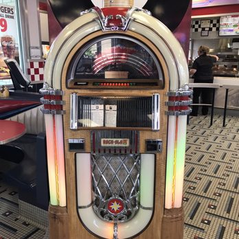 Burger King - a juke box with a clock on top - Fast Food Near Me - Frederick, Maryland