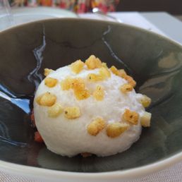 Tartar of tomatoes with anchovies and cheese mousse.