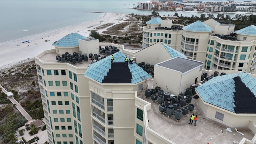 Slide of Febres Roofing