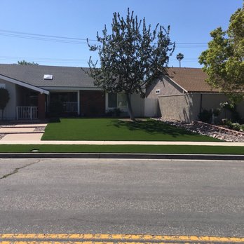Preferred Turf - Finished product including the rock stream, main area and parkway, and rock area next to walkway. - Artificial Turf Near Me Preferred Turf - Finished product including the rock stream, main area and parkway, and rock area next to walkway. - Artificial Turf Near Me