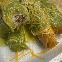 Arsenios Mexican Food - 20. Three Rolled Tacos with Guacamole . Pre frozen & was cold..