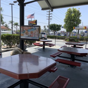 Sonic Drive-In - outdoor patio with the benches 5.12.21 - Burgers Near Me - Fullerton, California Sonic Drive-In - outdoor patio with the benches 5.12.21 - Burgers Near Me - Fullerton, California