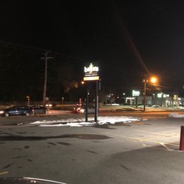 an empty parking lot at night an empty parking lot at night