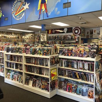 Flying Colors Comics & Other Cool Stuff - Interior-each set of bookshelves is a different publisher. Except where it isn't. - Toy Stores Near Me - Concord, California Flying Colors Comics & Other Cool Stuff - Interior-each set of bookshelves is a different publisher. Except where it isn't. - Toy Stores Near Me - Concord, California