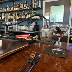 JJ’s Table and Bar - House smoked Manhattan in progress