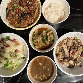 Joy Cup Noodles Mean - Dan Dan Noods, Blanket Noods, Sesame chicken, and Cucumber salad. All delicious!! - Noodles Near Me - Honolulu, Hawaii