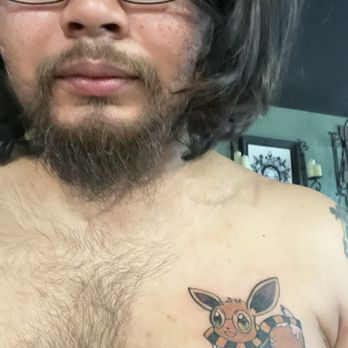 Renaissance Tattoo Studio - Eevee tattoo with hufflepuff scarf - Tattoo Near Me - San Clemente, California Renaissance Tattoo Studio - Eevee tattoo with hufflepuff scarf - Tattoo Near Me - San Clemente, California