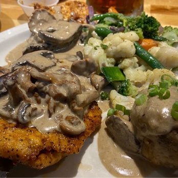 Bavarian Grill - Klassisches Schwammer'l Schnitzel : A pan-seared, unbreaded Schnitzel topped with wild Mushroom Ragout! - German Near Me - Plano, Texas