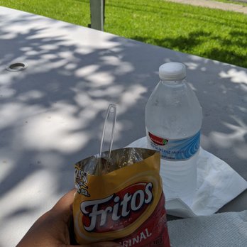 DD's Snack-N-Lunch Shop - ows a bag of frito's sitting on a picnic table - Cajun/Creole Near Me - Lafayette, Louisiana DD's Snack-N-Lunch Shop - ows a bag of frito's sitting on a picnic table - Cajun/Creole Near Me - Lafayette, Louisiana