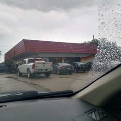 Kwik Stop Food Stores - Where the white trucks are parked supposed to be handicap parking