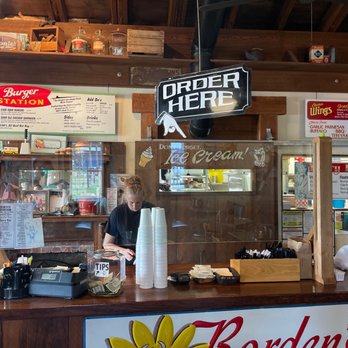The Burger Station - a man behind the counter - Burgers Near Me - Hernando, Florida The Burger Station - a man behind the counter - Burgers Near Me - Hernando, Florida