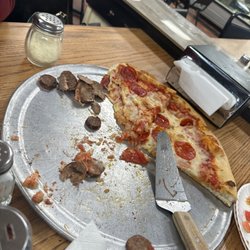Nizza Pizza Pasta & Subs - Cheese Pizza with pepperoni and Italian Sausage