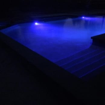 Trinity Custom Pools - Midnight Blue pebble at night with Blue LED lights. Even in the darkness of night you can always see the bottom of the pool. So Cool!!! - Pool & Hot Tub Service Near Me - Riverside, California