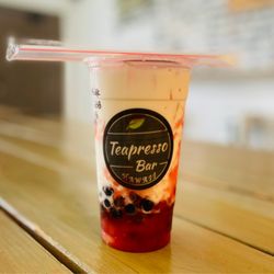 Teapresso Bar - Strawberry milk with boba and strawberry popping boba - yummy