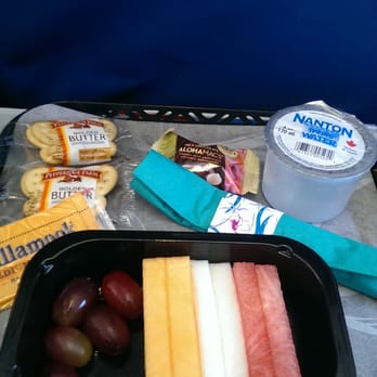 Hawaiian Airlines - Complimentary snack (cheese, crackers, fruit and chocolate) - Airlines Near Me - Oakland, California