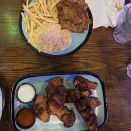 Wings and a beef dish. The fries were awesome. Wings and a beef dish. The fries were awesome.