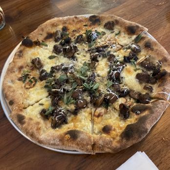 All Souls Pizza - Mushroom and fontina pie - Pizza Near Me - Asheville, North Carolina All Souls Pizza - Mushroom and fontina pie - Pizza Near Me - Asheville, North Carolina