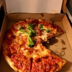 Half bacon/broccoli,half cheese.  Notice the paper towel in the back to indicate how small a small pizza really is.