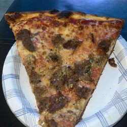 Garlic and meatball pizza slice