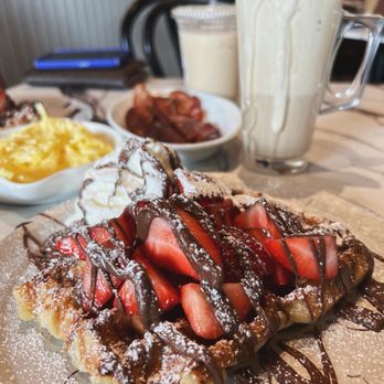 Zinneken's Belgian Waffles - Liege Waffle with strawberries, Nutella, and whipped cream - Coffee & Tea Near Me - Glastonbury, Connecticut Zinneken's Belgian Waffles - Liege Waffle with strawberries, Nutella, and whipped cream - Coffee & Tea Near Me - Glastonbury, Connecticut