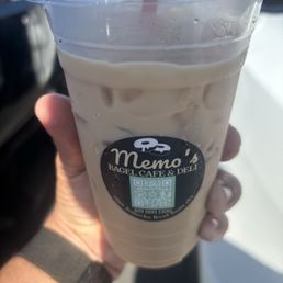 Small coffee in a large cup more ice and milk