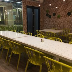 Bien Bueno - Dining room with Lemon and honey comb theme
