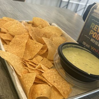 Uberrito - Tortilla chips with cilantro lime dressing. - Mexican Near Me - Sugar Land, Texas