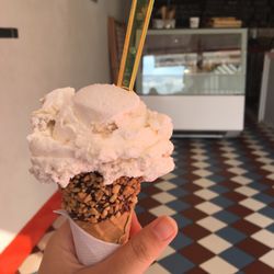 Scoop - Raffaello (coconut almond ball) ice cream in a chocolate almond cone. :)
