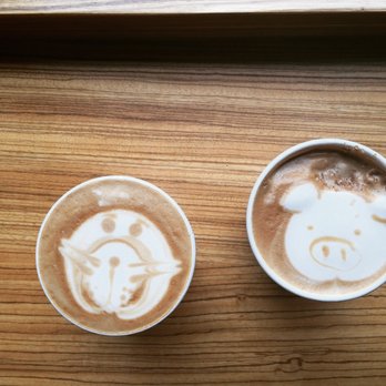 Moore Coffee Shop - Latte art- walrus & pig cappuccino - Coffee & Tea Near Me - Seattle, Washington