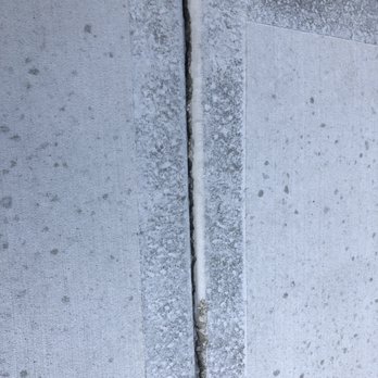 Creekview Builders - Original walkway which was deteriorating and lifting up after only 3 months of occupying the build. - General Contractors Near Me - Mokena, Illinois