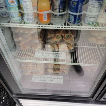 Maatouk Bakery - a cat in a refrigerator - Bakeries Near Me - Sterling Heights, Michigan