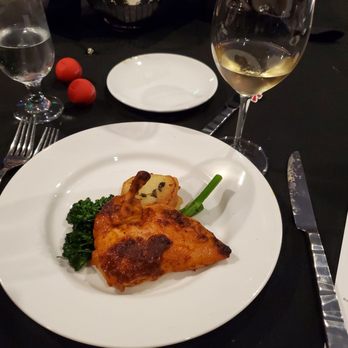 VUE Bar + Restaurant - Roasted  achiote chicken,pomme anna and roasted broccoli with a white wine - Bars Near Me - Long Beach, California