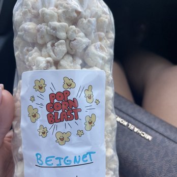 Popcorn Blast - a person holding a bag of popcorn - Popcorn Shops Near Me - Houston, Texas Popcorn Blast - a person holding a bag of popcorn - Popcorn Shops Near Me - Houston, Texas