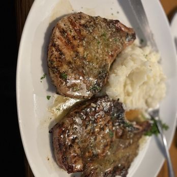 Regina's Restaurant - Pork chop with garlic sauce - Mediterranean Near Me - Silver Spring, Maryland Regina's Restaurant - Pork chop with garlic sauce - Mediterranean Near Me - Silver Spring, Maryland