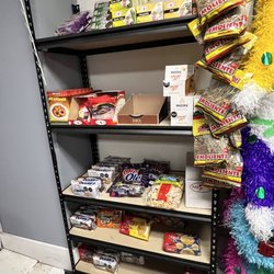 Mi Esperanza Latina - Small cookie, snack area in back (low on stock). Even piñatas near the rear of store.