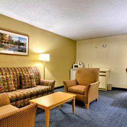 Katahdin Inn and Suites - Living Room Area of our Executive King Suite.