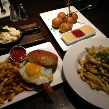 Eureka! - Mac n cheese alfredo, jalapeño egg burger, lollipop corn dog, and truffle fries. - Burgers Near Me - Claremont, California