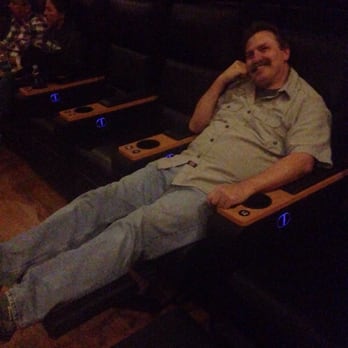 Regal Riverside Plaza - My husband enjoying the clean, comfortable, recliners - Cinema Near Me - Riverside, California