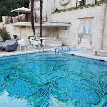 Swiss Diamond Hotel - Amazing art on the bottom of the pool - Hotels Near Me - Vico Morcote, TI