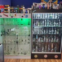 Smokers Cabinet - More pipes hanging out in the back of the shop. Hookahs, hookah supplies, and torches reside here too.