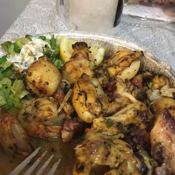 Greek Taverna - Mixed seafood grill, basically 85% calamari, 10% octopus and 5% shrimp - Greek Near Me - Edgewater, New Jersey Greek Taverna - Mixed seafood grill, basically 85% calamari, 10% octopus and 5% shrimp - Greek Near Me - Edgewater, New Jersey