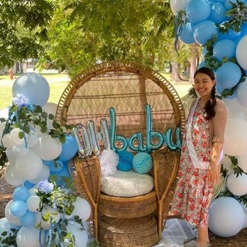 Vivid Events - Balloon garland, peacock rattan chair, eucalyptus, photo booth, blue, white - Party & Event Planning Near Me Vivid Events - Balloon garland, peacock rattan chair, eucalyptus, photo booth, blue, white - Party & Event Planning Near Me