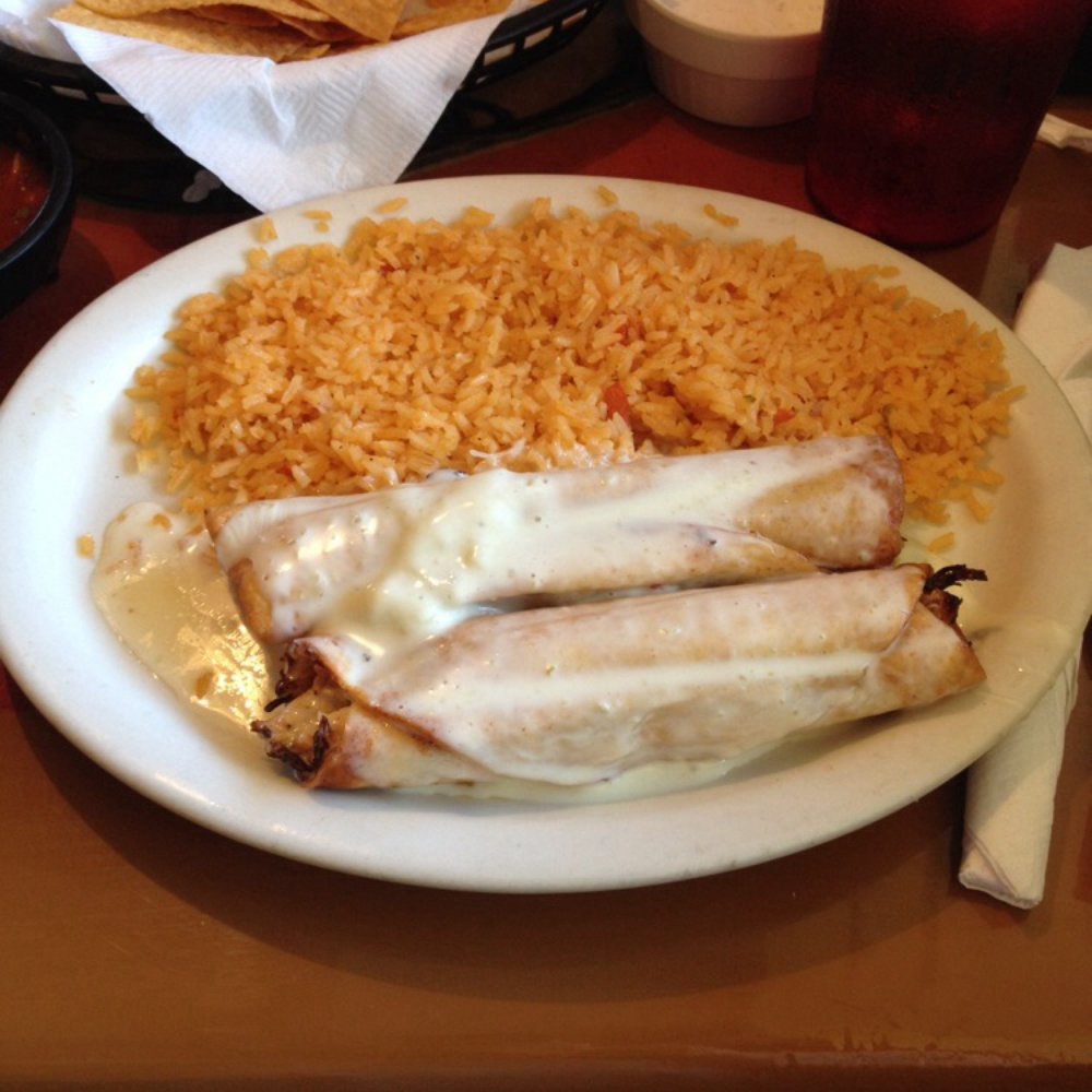 Grand Azteca V - Chicken Chimichonga with Rice - Mexican Near Me - Troy, Michigan Grand Azteca V - Chicken Chimichonga with Rice - Mexican Near Me - Troy, Michigan