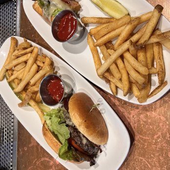 Sweetwater Tavern And Grille - The burgers are huge and we shared. They will cut them for you :-) - American Near Me - Chicago, Illinois Sweetwater Tavern And Grille - The burgers are huge and we shared. They will cut them for you :-) - American Near Me - Chicago, Illinois
