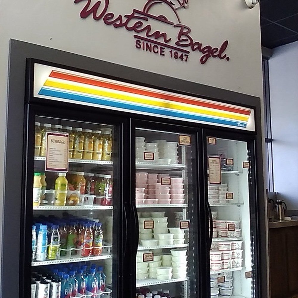 Western Bagel - Fridge with full of different flavors, variety of spreads.. They didn't have my favorite. Also bottled drinks. - Bagels Near Me - Studio City, California Western Bagel - Fridge with full of different flavors, variety of spreads.. They didn't have my favorite. Also bottled drinks. - Bagels Near Me - Studio City, California
